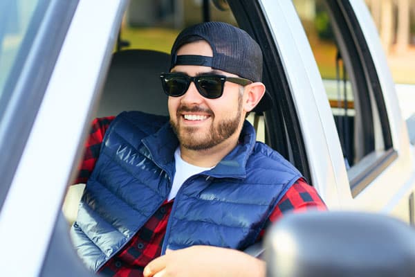 Young guy in new truck